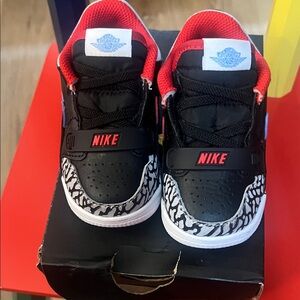 Jordan Kids Black and Red Sneakers with Zebra Pattern